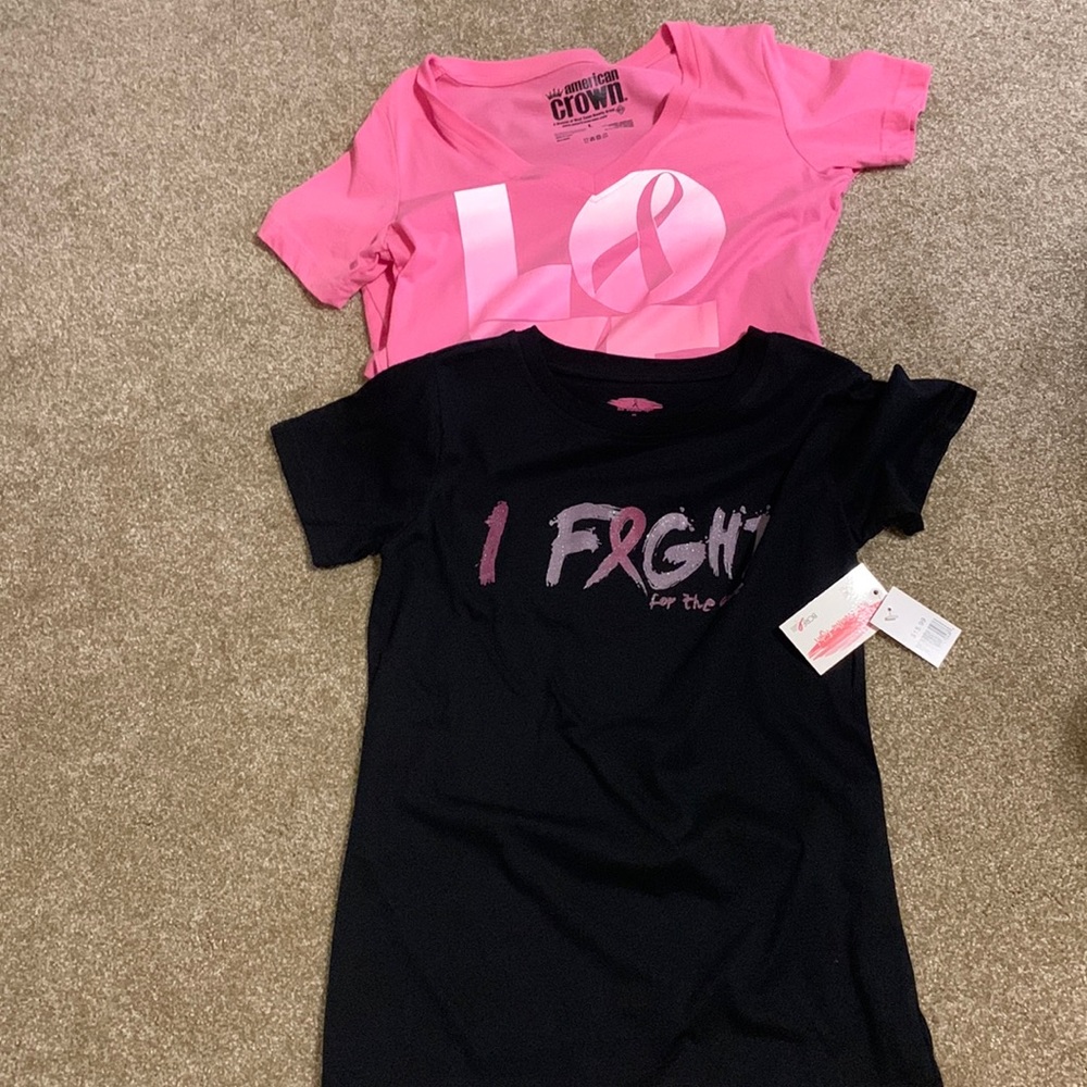 Breast Cancer Awareness. Two t shirts. Black NWT size M. Pink size L.